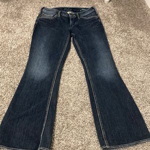 Silver bootcut jeans (28)